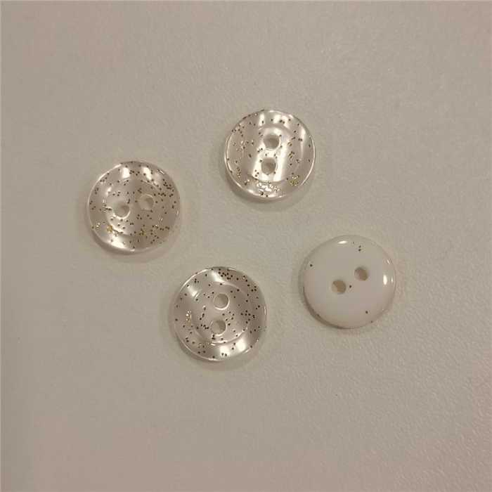 Bouton 2 trous paillettes dorées 12,5 mm Bouton 2 trous paillettes dorées 12,5 mm