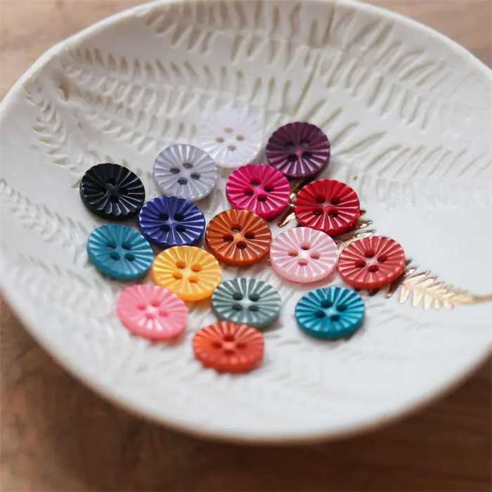 Bouton 4 trous pâquerette Bouton 4 trous pâquerette