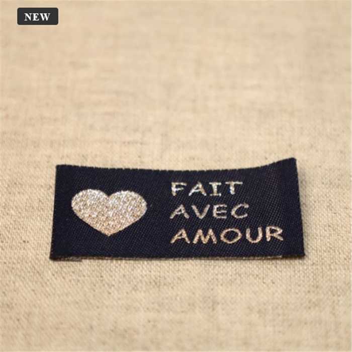 Etiquette tissée "Fait avec amour" - 10 pièces Etiquette tissée "Fait avec amour" - 10 pièces